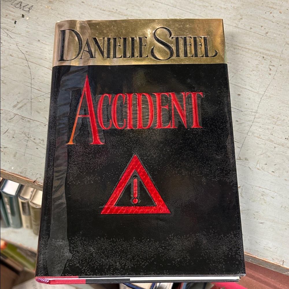 'Accident' Hardcover Book - Black and Gold